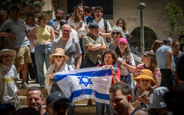 Secular people demonstrate in support of a cafe that opens on Shabbat n central Jerusalem, July 11, 2026. (Yonatan Sindel/Flash90)