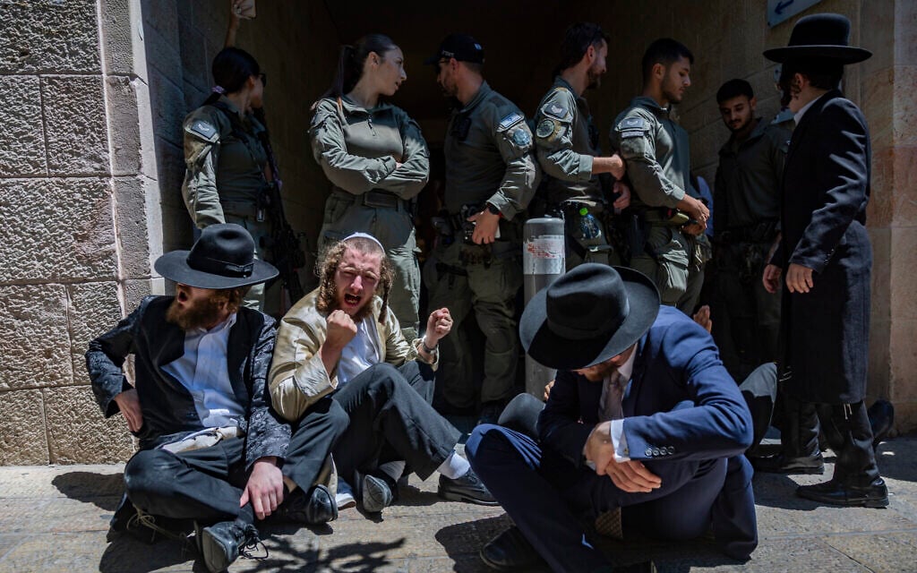 Ultra-Orthodox protesters demonstrate against a cafe operating on Shabbat in central Jerusalem, July 11, 2026. (Yonatan Sindel/Flash90) Ultra-Orthodox protesters demonstrate against a cafe operating on Shabbat in central Jerusalem, July 11, 2026. (Yonatan Sindel/Flash90)