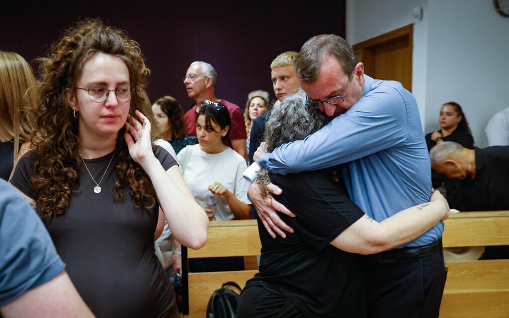 Family members of Maya Vishniak after her partner is sentenced for her murder at the Tel Aviv District Court in Tel Aviv, July 12, 2026 (Yehoshua Yosef/Flash90) Family members of Maya Vishniak after her partner is sentenced for her murder at the Tel Aviv District Court in Tel Aviv, July 12, 2026 (Yehoshua Yosef/Flash90)
