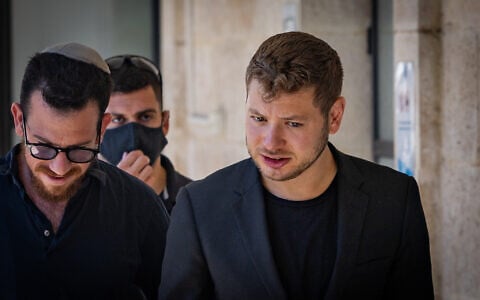 Yair Netanyahu arrives for a court hearing on his request for a restraining order against Haaretz journalist Uri Misgav at the Jerusalem District Court in Jerusalem, July 15, 2026. (Chaim Goldberg/Flash90)