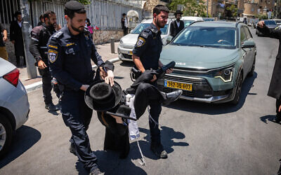 Ultra-Orthodox Jews protest against the drafting of Haredi youth to the Israeli army, in Jerusalem, July 15, 2026. (Chaim Goldberg/Flash90) Ultra-Orthodox Jews protest against the drafting of Haredi youth to the Israeli army, in Jerusalem, July 15, 2026. (Chaim Goldberg/Flash90)