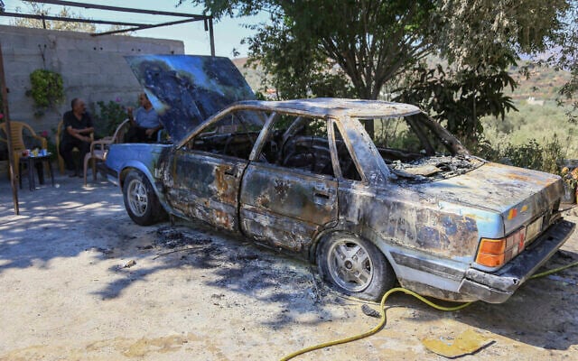 Palestinians inspect the damage following an attack by Israeli settlers in the village of Ramin, west of Nablus, in the West Bank, July 16, 2026 (Nasser Ishtayeh/Flash90)
