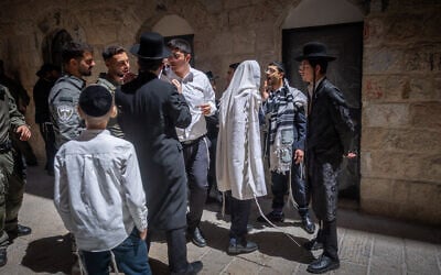 Ultra-Orthodox protesters demonstrate against a cafe operating on Shabbat in central Jerusalem, July 18, 2026. (Yonatan Sindel/Flash90) Ultra-Orthodox protesters demonstrate against a cafe operating on Shabbat in central Jerusalem, July 18, 2026. (Yonatan Sindel/Flash90)