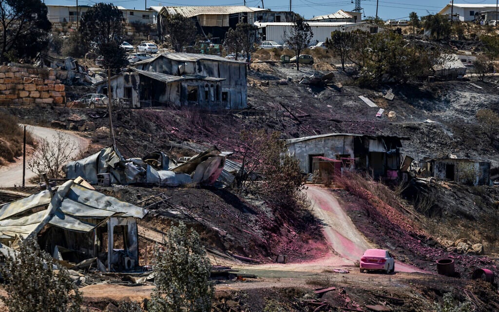 13 homes burnt, dozens damaged in West Bank settlement as crews battle blaze for 2nd day