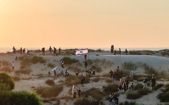 Israeli settler activists march through southern Israel toward the Gaza border as they call to resettle the Palestinian enclave, on July 19, 2026. (Tsafrir Abayov/Flash90)