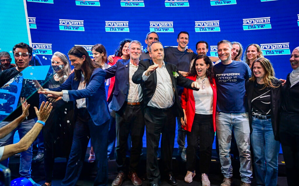 Democrats leader Yair Golan celebrates with the winners of the left-wing party's primary election, after the results were announced in Tel Aviv on July 20, 2026. (Avshalom Sassoni/Flash90)