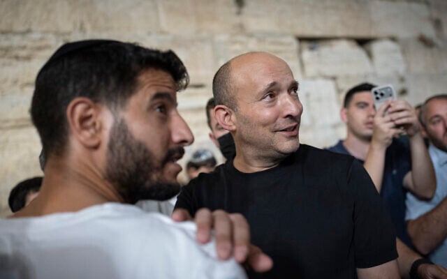 Together party head Naftali Bennett visits the Western Wall in Jerusalem’s Old City, during Tisha B’Av, July 22, 2026. (Yonatan Sindel/Flash90)