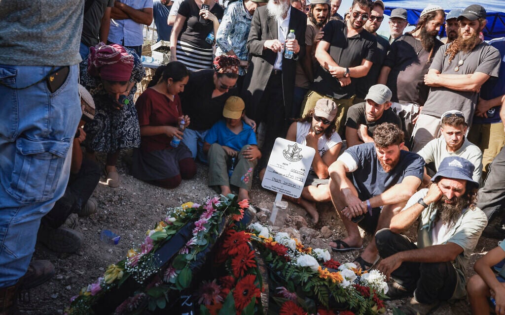 Family, friends and residents attend the funeral of Benayahu Mellet at the Israeli settlement of Havat Gilad in the West Bank, July 24, 2026. (Hilel Ben Or/Flash90)