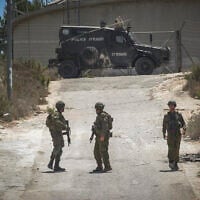 IDF soldiers operate in the village of Tell, near the West Bank city of Nablus, July 25, 2026. (Nasser Ishtayeh/Flash90)