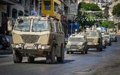 Israeli security forces operate during a raid in the West Bank city of Nablus, July 26, 2026. (Nasser Ishtayeh/Flash90)