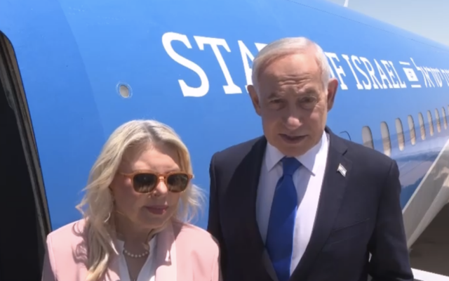 Prime Minister Benjamin Netanyahu and his wife Sara board the Wing of Zion plane on their way to Washington, July 27, 2026 (Screenshot/GPO)