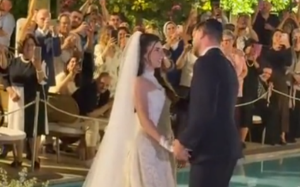 Former hostages Sasha Troufanov and Sapir Cohen are married, July 5, 2026 (Video screenshot)
