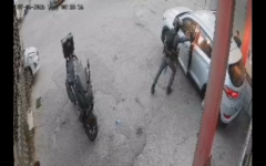 Screengrab of a CCTV video showing a Border Police officer throwing a stun grenade into a car full of passengers and forcing the door shut as it explodes, July 5, 2026. (X, used in accordance with Clause 27a of the Copyright Law)