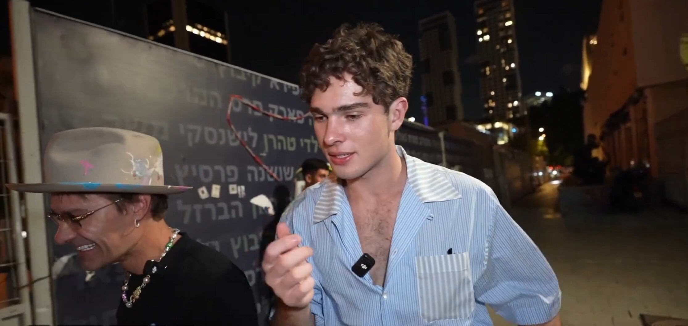 Netanyahu adviser filmed speaking with antisemitic influencer in Tel Aviv...