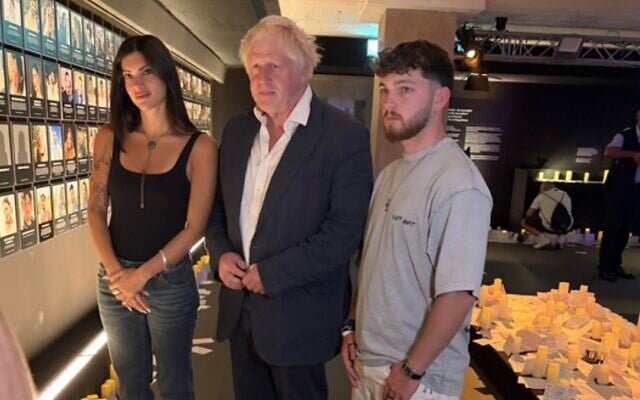 Former British prime minister Boris Johnson with released hostage Bar Kuperstein and Nova survivor May Hayat at the Nova Exhibition London, July 14, 2026. (Nova Exhibition London) Former British prime minister Boris Johnson with released hostage Bar Kuperstein and Nova survivor May Hayat at the Nova Exhibition London, July 14, 2026. (Nova Exhibition London)