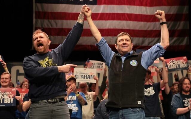 Graham Platner and Troy Jackson (R), who is running to replace Platner as the Democratic nominee for the U.S. Senate, stand together during a “Fighting Oligarchy” tour stop at the Collins Center for the Arts on the University of Maine campus on May 24, 2026, in Orono, Maine. (Joe Raedle/Getty Images via JTA) Graham Platner and Troy Jackson (R), who is running to replace Platner as the Democratic nominee for the U.S. Senate, stand together during a “Fighting Oligarchy” tour stop at the Collins Center for the Arts on the University of Maine campus on May 24, 2026, in Orono, Maine. (Joe Raedle/Getty Images via JTA)