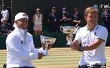 Israel's Guy Sasson, left, and Netherlands' Niels Vink receive the Wimbledon trophy after winning the quad wheelchair doubles on July 11, 2026. (Screenshot: Wimbledon/YouTube)