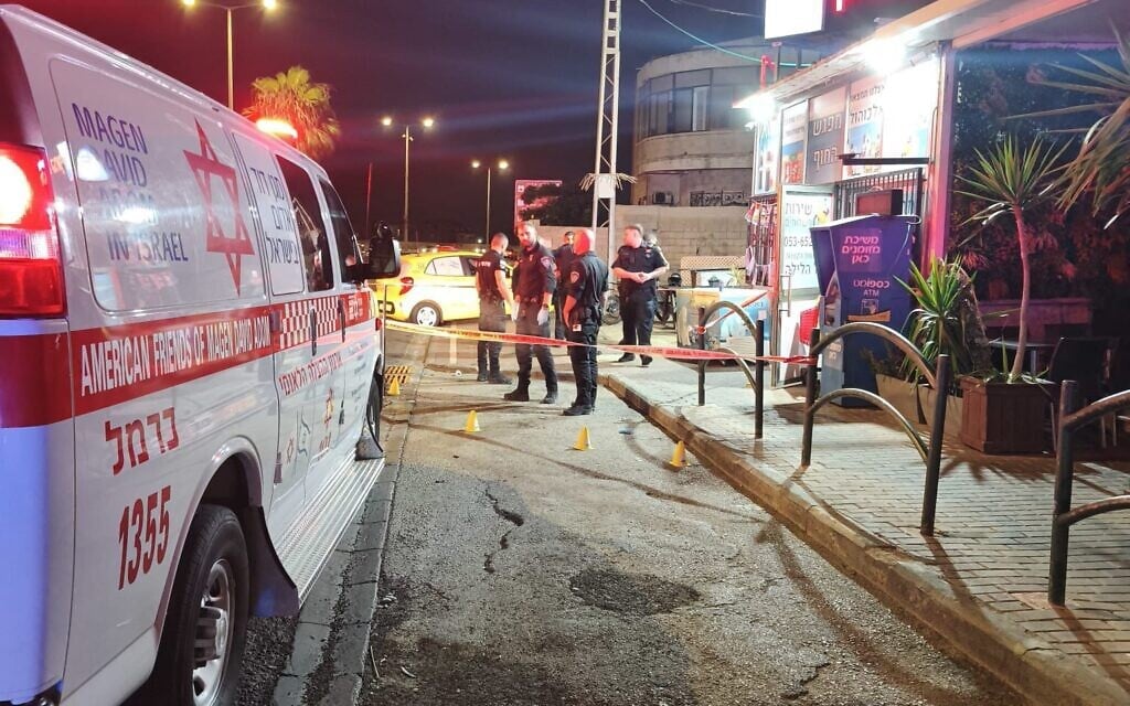 First responders at the scene of a shooting in Haifa early in the morning of July 2, 2026. (MDA)