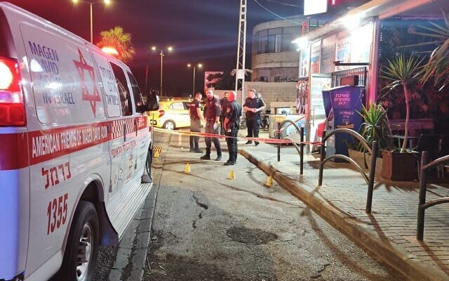 First responders at the scene of a shooting in Haifa early in the morning of July 2, 2026. (MDA)