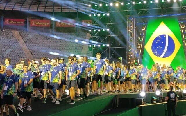 Delegates march at the opening ceremony of the Maccabiah Games at Teddy Stadium in Jerusalem, July 1, 2026 (Zev Stub/Times of Israel)