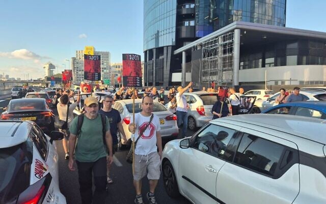 Protesters march on Ayalon Highway in Tel Aviv to demand a state commission of inquiry into the Hamas-led October 7, 2023, attack, as they mark 1000 days since the massacre, on July 2, 2026. (Idit Avishay/Pro-Democracy Protest Movement)