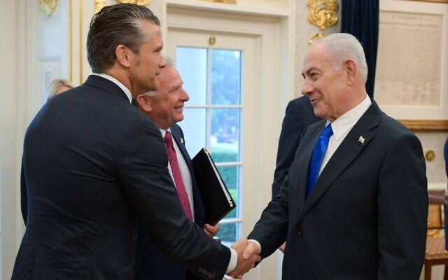 US Defense Secretary Pete Hegseth shakes hands with Prime Minister Benjamin Netanyahu in the Oval Office on July 28, 2026, alongside US special envoy Steve Witkoff. (GPO)