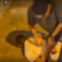 Police were seen detaining murder suspect Avior Sasson in a taxi in the Harel Tunnel at the entrance to Jerusalem, July 28, 2026. (Screen capture/Israel Police)