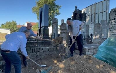 Representatives from the World Zionist Organization, the Foreign Ministry, and ZAKA help exhume the bodies of Theodor Herzl's grandparents, Shimon and Rivka Herzl, in Belgrade, Serbia, July 29, 2026. (World Zionist Organization/ ZAKA) Representatives from the World Zionist Organization, the Foreign Ministry, and ZAKA help exhume the bodies of Theodor Herzl's grandparents, Shimon and Rivka Herzl, in Belgrade, Serbia, July 29, 2026. (World Zionist Organization/ ZAKA)