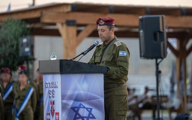 Central Command chief Maj. Gen. Avi Bluth speaks during a handover ceremony for the commander of the 99th Division, near Netiv Haasara on the Gaza border, July 15, 2026. (Israel Defense Forces)