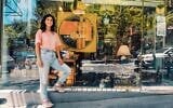 Batya 'Betty' Ezri stands in front of Batya Vintage House on Shlomzion HaMalka, 2026. (Gabi Nissan)