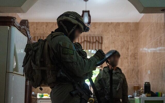 IDF soldiers measure the home of a Palestinian involved in a deadly shooting in the West Bank village of Tell, in a photo published July 26, 2026. (Israel Defense Forces) IDF soldiers measure the home of a Palestinian involved in a deadly shooting in the West Bank village of Tell, in a photo published July 26, 2026. (Israel Defense Forces)