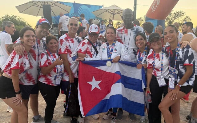 Hella Eskenazi (C) poses with the Cuban delegation for the Maccabiah Games in Israel. (Courtesy Hella Eskenazi)