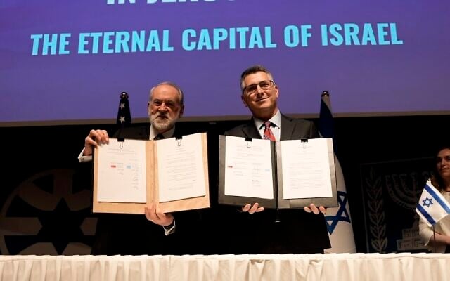 US Ambassador to Israel Mike Huckabee and Foreign Minister Gideon Sa'ar attend a formal signing ceremony at the Foreign Ministry of an agreement to allocate land at the Allenby Complex for the construction of a permanent US Embassy compound in Jerusalem on July 1, 2026. (Boaz Oppenheim/GPO) US Ambassador to Israel Mike Huckabee and Foreign Minister Gideon Sa'ar attend a formal signing ceremony at the Foreign Ministry of an agreement to allocate land at the Allenby Complex for the construction of a permanent US Embassy compound in Jerusalem on July 1, 2026. (Boaz Oppenheim/GPO)