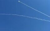 An interception seen in the sky near the Israeli city of Eilat and adjacent Jordanian city of Aqaba amid an Iranian missile attack on July 19, 2026. (screen capture: Telegram)