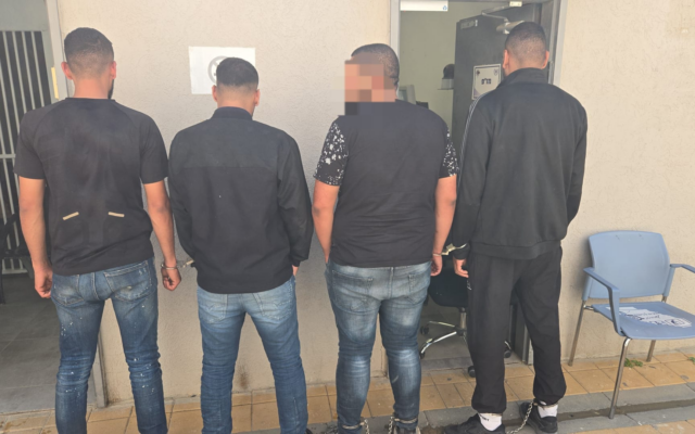 Four men, arrested in connection to a shooting incident in Ar'ara Banegev, are seen in a handout photo on July 22, 2026. (Israel Police)