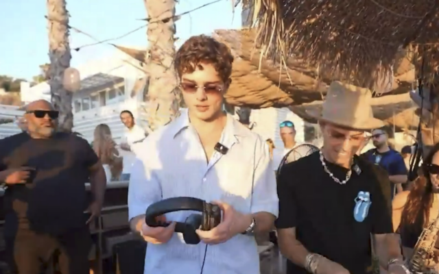 Controversial 'looksmaxxing' influencer Clavicular is seen on the beach in Tel Aviv in July 2026. (Screenshot/Kick)
