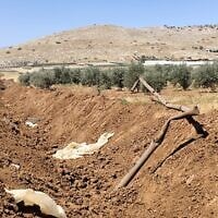 A water pipeline severed during construction of the security barrier in the northern Jordan Valley, July 2026. (Ilan Volkov/Jordan Valley Activists)
