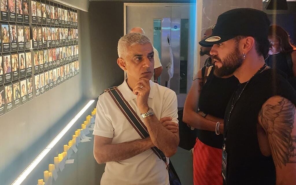 Mayor of London Sadiq Khan (L) speaks to British-Israeli Nova festival survivor Sean Burns at the Nova Exhibition London, on July 9, 2026. (Nova Exhibition London)