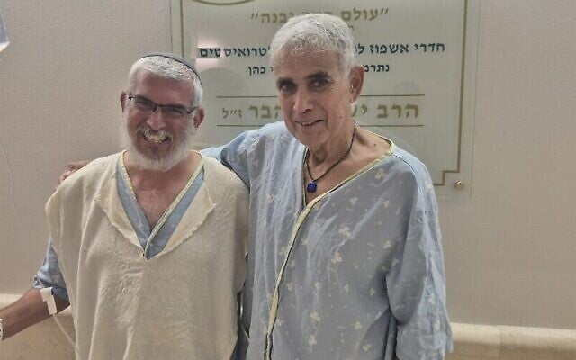 Yonatan Rom, left, who donated his kidney to Reuven Tam, right, recover together following the transplant at Clalit-Beilinson Hospital on July 14, 2026. Reuven's brother, Eyal Tam, saved Rom's life in a terrorist attack on March 7, 2002. (Courtesy/Clalit-Beilinson Hospital)