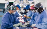 Israeli cardiac surgeons from Wolfson Medical Center in Holon and Save a Child's Heart (SACH) and Zambian surgeons perform open-heart surgery on a child in an operating room at National Heart Hospital in Lusaka, Zambia, on July 14, 2026. (Courtesy/Save a Child's Heart)