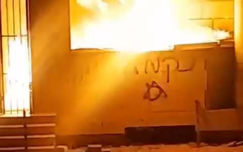 Footage posted to social media appears to show a mosque burning in the village of Qusra, south of Nablus, in the West Bank, after an alleged settler attack, July 26, 2026. (Screenshot via X, used in accordance with Clause 27a of the Copyright Law)