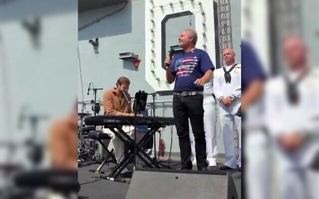 Former Hamas hostage Alon Ohel, left, plays the keys as US singer John Ondrasik sings his hit ballad 'Superman' aboard the USS Nimitz aircraft carrier in New York Harbor on July 4, 2026. (Screen capture: PR via X) Former Hamas hostage Alon Ohel, left, plays the keys as US singer John Ondrasik sings his hit ballad 'Superman' aboard the USS Nimitz aircraft carrier in New York Harbor on July 4, 2026. (Screen capture: PR via X)