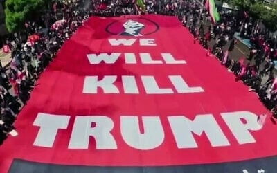 A large sign saying "We will kill Trump" is carried by funeral-goers in Mashhad, Iran, where supreme leader Ali Khamenei was being buried on July 9, 2026. (via X, used in accordance with Clause 27a of the Copyright Law) A large sign saying "We will kill Trump" is carried by funeral-goers in Mashhad, Iran, where supreme leader Ali Khamenei was being buried on July 9, 2026. (via X, used in accordance with Clause 27a of the Copyright Law)