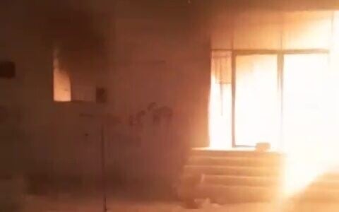 Footage posted to social media appears to show a mosque burning in the village of Qusra, south of Nablus, in the West Bank, after an alleged settler attack, July 26, 2026. (Screenshot via X, used in accordance with Clause 27a of the Copyright Law)