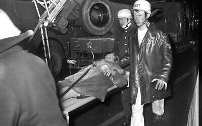 Emergency services evacuate residents of a Jewish retirement home in Munich after it was targeted in an arson attack on February 13, 1970, in which seven Holocaust survivors were killed. (IMAGO/Heinz Gebhardt via Reuters Connect) Emergency services evacuate residents of a Jewish retirement home in Munich after it was targeted in an arson attack on February 13, 1970, in which seven Holocaust survivors were killed. (IMAGO/Heinz Gebhardt via Reuters Connect)