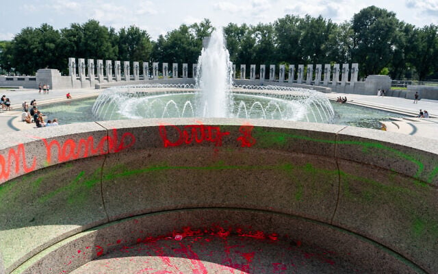 Damage seen after vandals poured bubble soap and painted graffiti on the World War II Memorial in Washington, DC on August 13, 2026. (Andrew Leyden/ZUMA Press Wire)