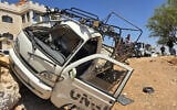 A damaged vehicle is seen following a reported attack by an Israeli army unmanned aerial vehicle (UAV) in the countryside of Quneitra, Syria, on August 22, 2026. (Huseyin Mesal / Anadolu)
