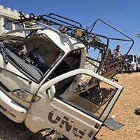 A damaged vehicle is seen following a reported attack by an Israeli army unmanned aerial vehicle (UAV) in the countryside of Quneitra, Syria, on August 22, 2026. (Huseyin Mesal / Anadolu)