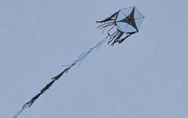 A kite, apparently flown from  the Gaza Strip, seen flying over Kibbutz Nahal Oz, August 22, 2026. (Social media, used in accordance with Clause 27a of the Copyright Law)