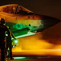 US Sailors signal an F-35C Lightning II on the flight deck of the USS George Washington, in a photo released August 30, 2026. (US Navy photo)
